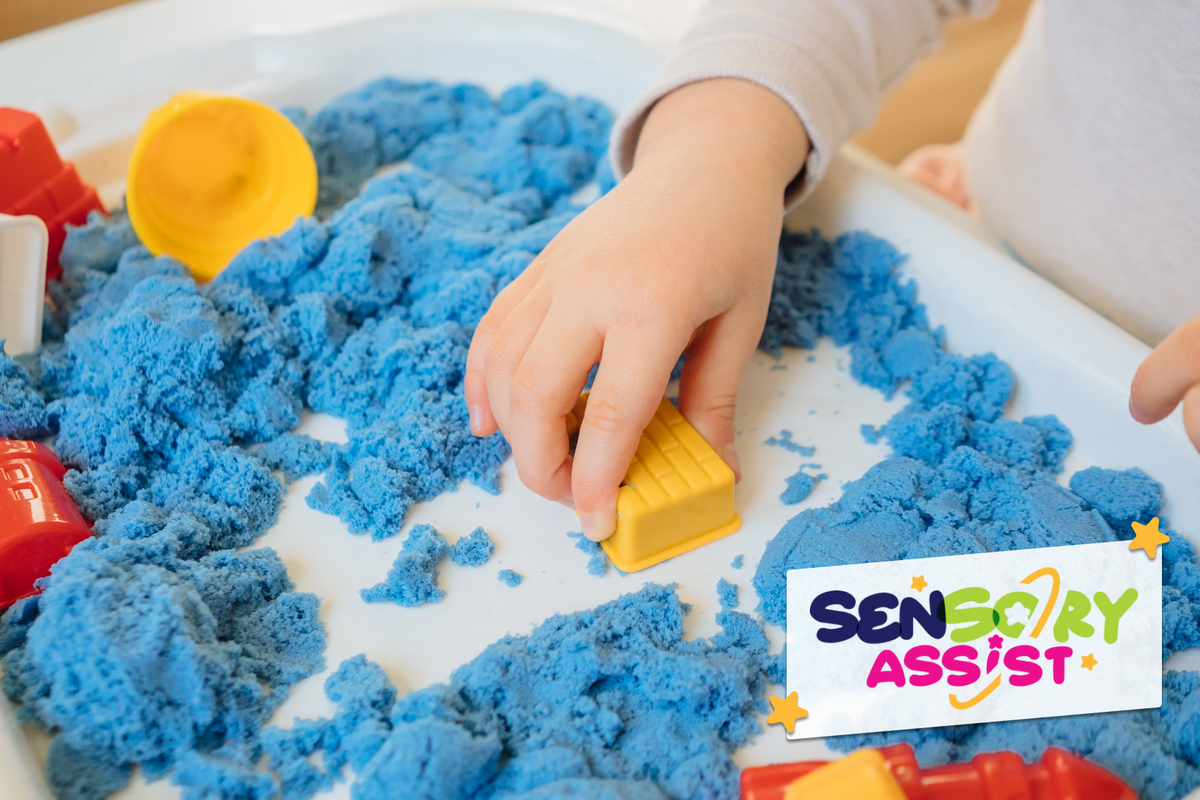 Child playing with Stretchy Sand from Sensory Assist in a sensory area designed to support students' concentration, stress relief and interaction.