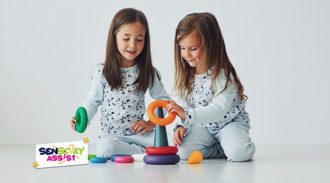 Girls engaging with sensory toys appropriate for their developmental stages