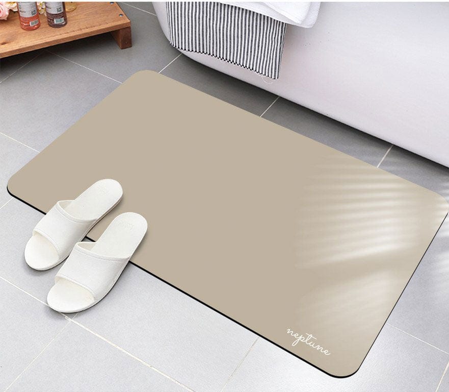 Diatomite fast-drying bathmat on bathroom floor