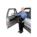 Man standing beside an open car door with the Car Caddie fitted