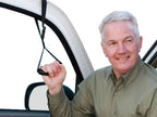 Man pulling himself up with the Stander Car Caddie