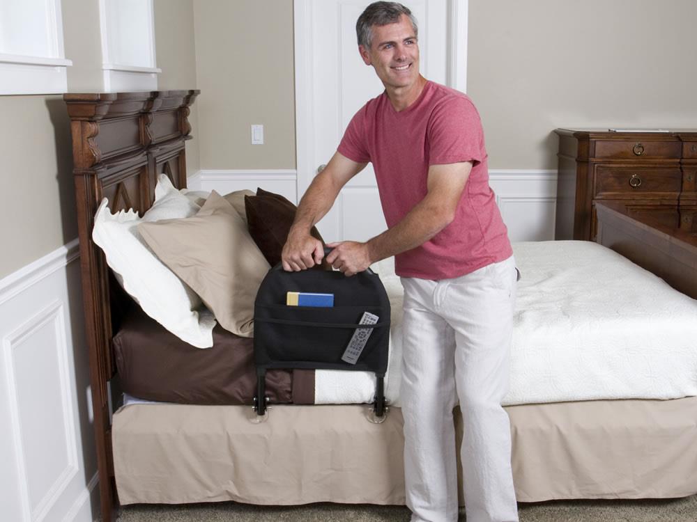 Woman getting out of bed with the Bed Rail Advantage Traveler