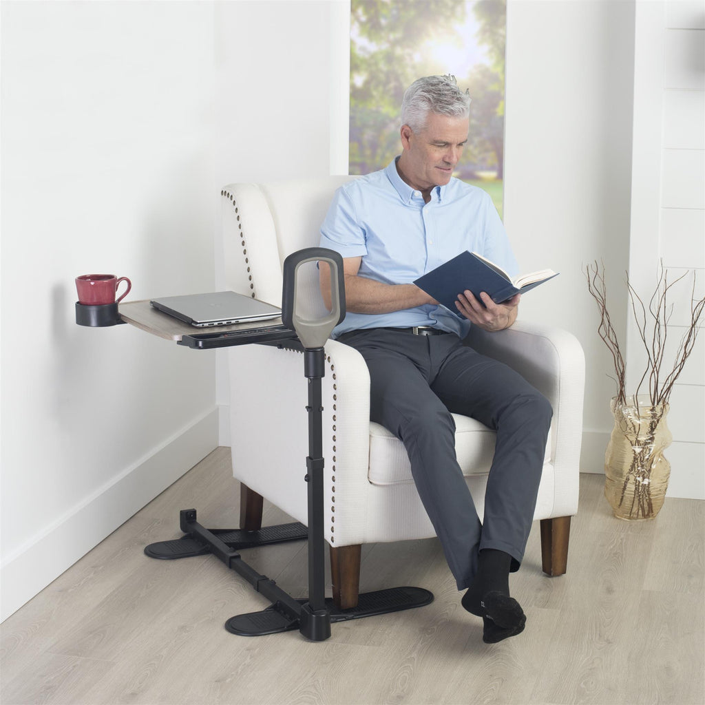 Man in a chair using the Wonder Tray Premium