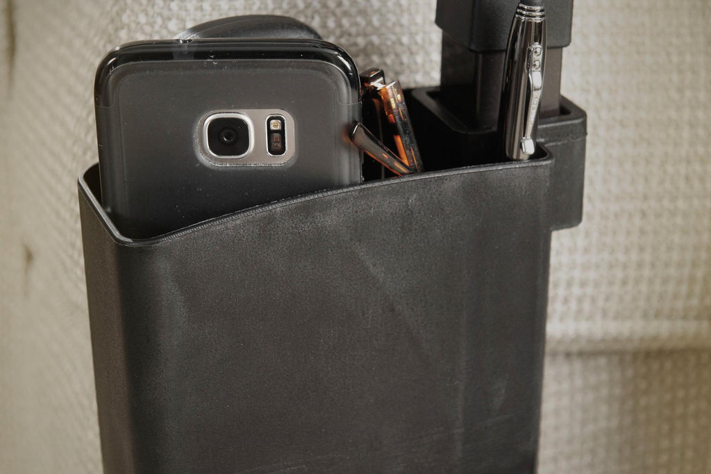 Independence Tray Table side pouch holding a phone