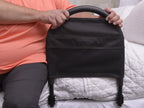 Hand adjusting the Bed Rail Advantage Traveler pouch