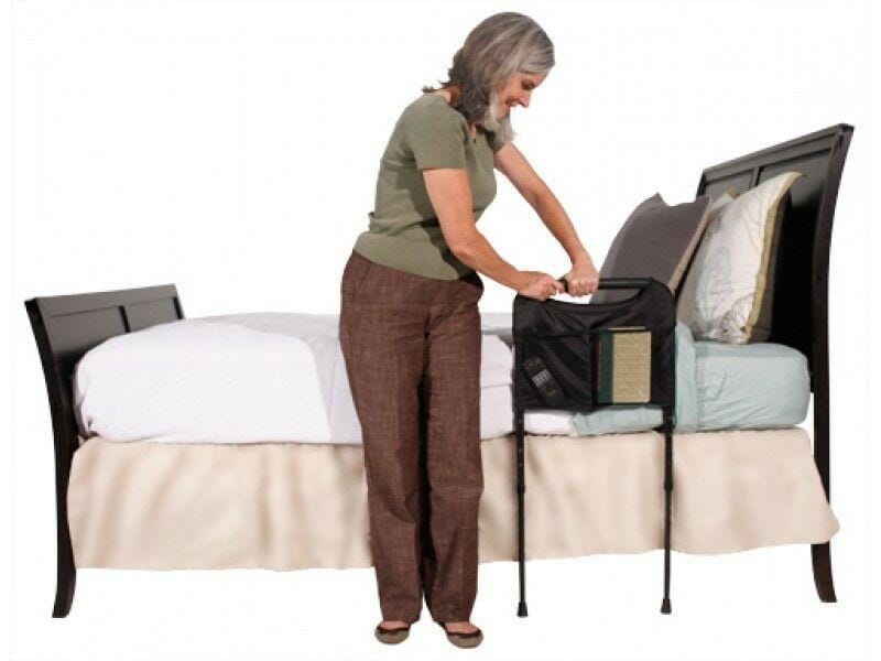 Woman getting out of bed with the Bedside Sturdy Rail